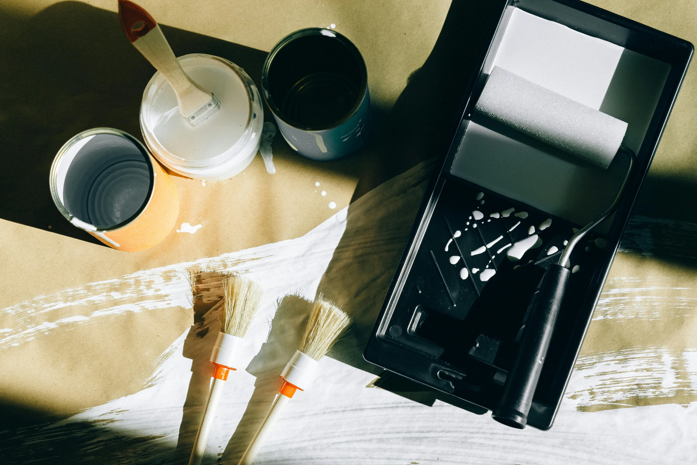 a box of paint and a brush on a table, by Julia Pishtar, pexels contest winner, fan favorite, mono printing, buff painting, opening shot