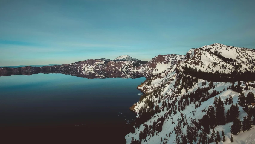 a large body of water surrounded by snow covered mountains, pexels contest winner, renaissance, crater lake, coastal cliffs, fine art print, multiple stories