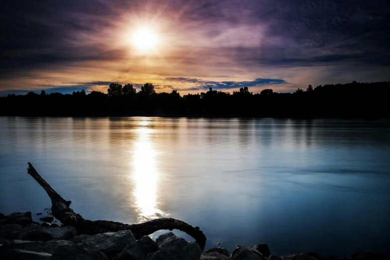 the sun is setting over a body of water, pexels contest winner, river gorgeous lighting, almost night, calm environment, instagram post