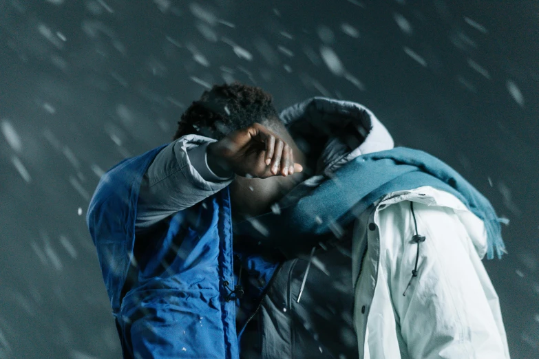 a couple of people standing next to each other in the snow, trending on unsplash, visual art, two men hugging, techwear clothes, avatar image, blue and grey