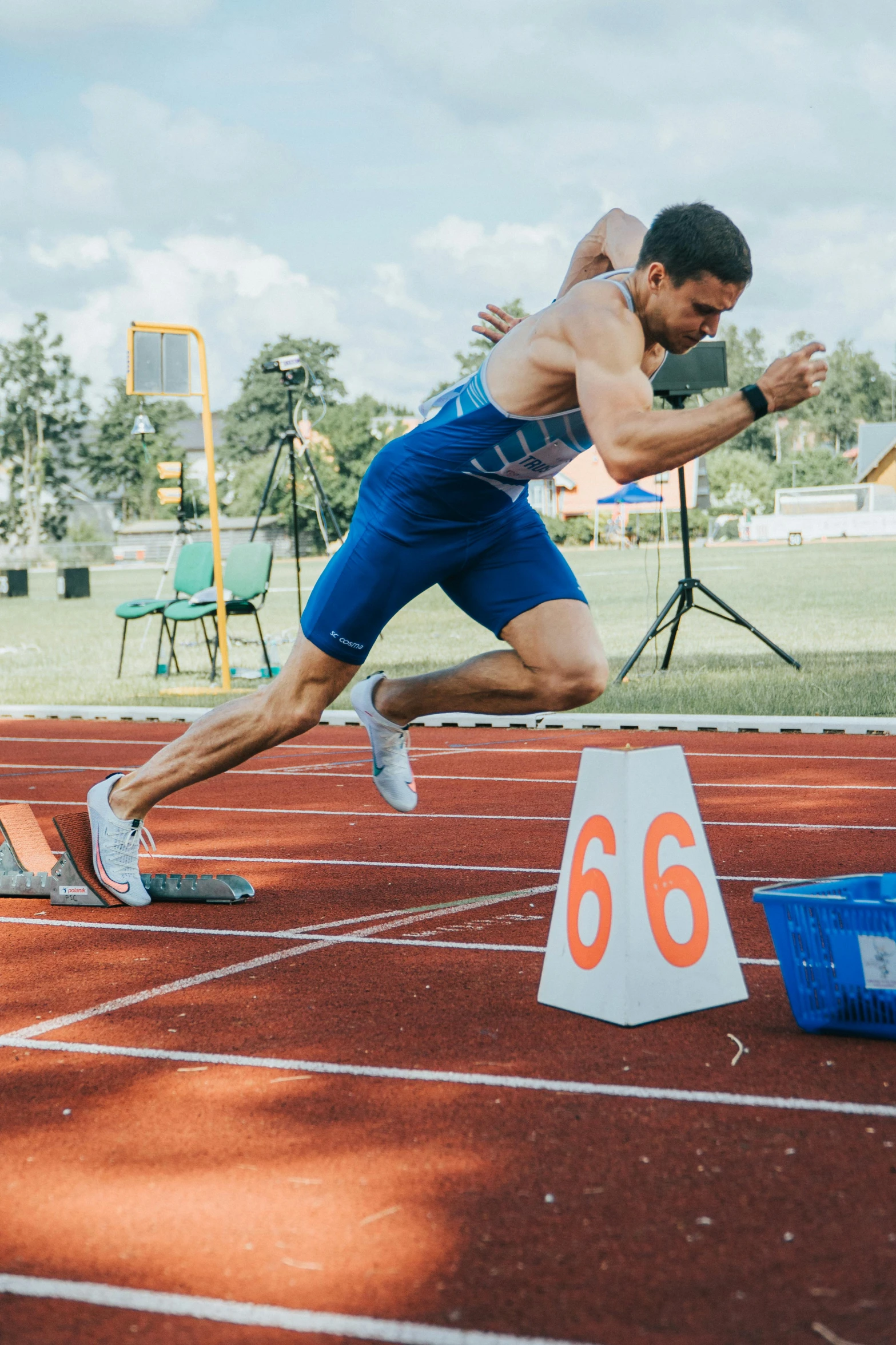 a man is running on a race track, a portrait, pexels contest winner, 🚿🗝📝, summer olympics footage, bulky build, thumbnail