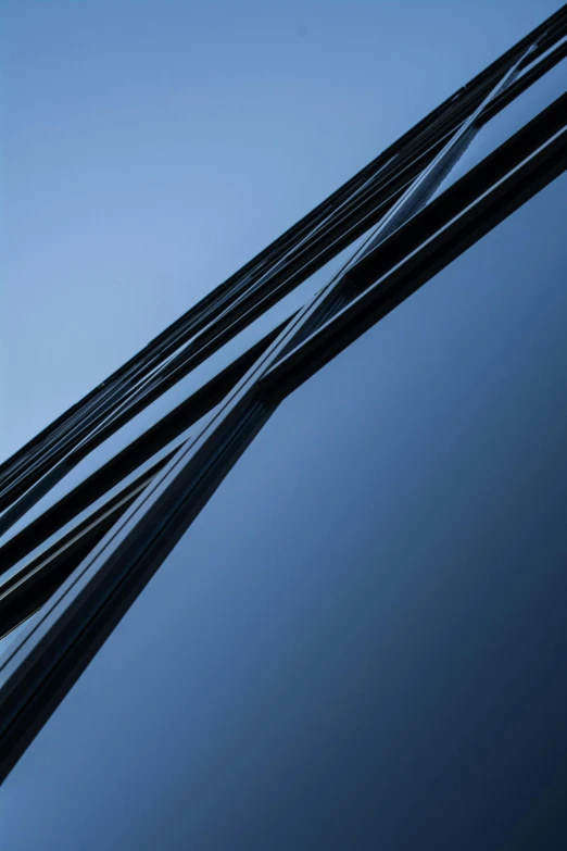 a large jetliner flying through a blue sky, an abstract sculpture, by Doug Ohlson, unsplash, minimalism, black lacquer, detail structure, strings, reflection