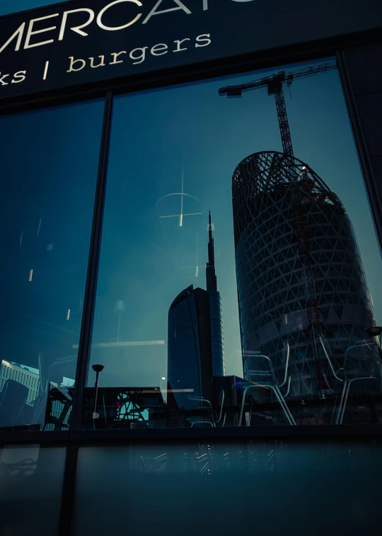 the reflection of a building in the window of a restaurant, a picture, by Adam Marczyński, unsplash contest winner, skyscrapers on the background, construction, ilustration, low light cinematic