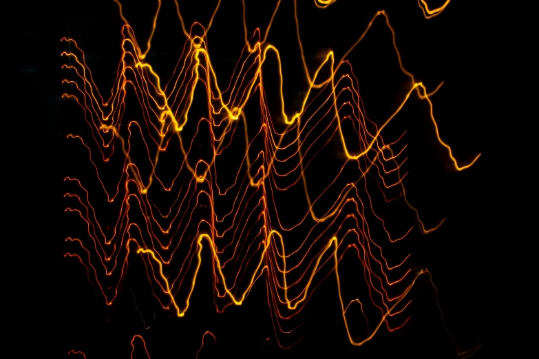 a blurry photo of a fire hydrant at night, by Thomas Häfner, lyrical abstraction, waveforms on top of square chart, black and gold wires, ( ( fractal waves ) ), orange neon