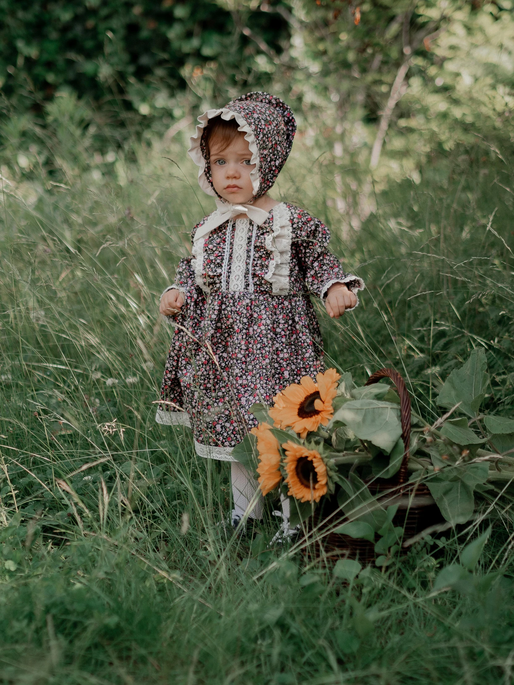 a little girl standing in a field with a basket of sunflowers, inspired by Kate Greenaway, unsplash, renaissance, made of flowers and berries, 1990s photograph, vintage doll, 😭 🤮 💕 🎀