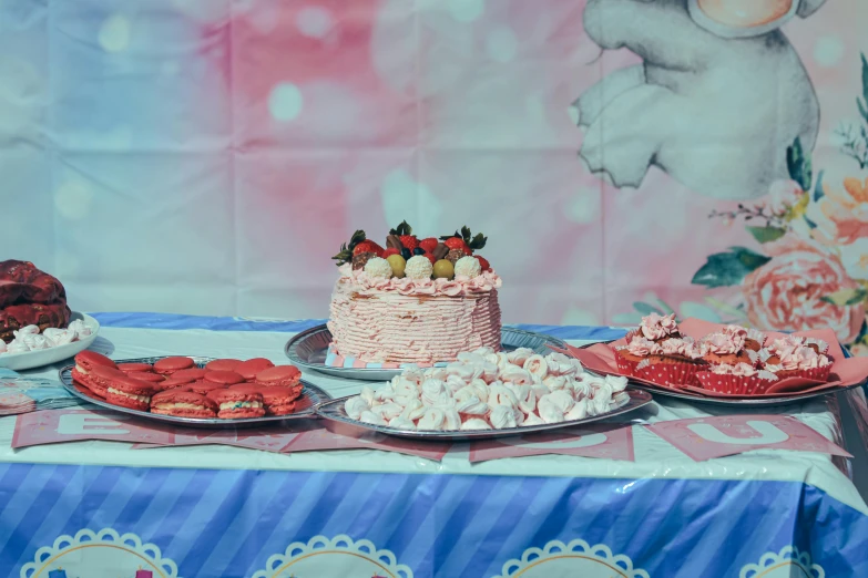 a table that has a bunch of desserts on it, an album cover, by Elsa Bleda, unsplash, hyperrealism, at a birthday party, pink and blue, 15081959 21121991 01012000 4k, red velvet