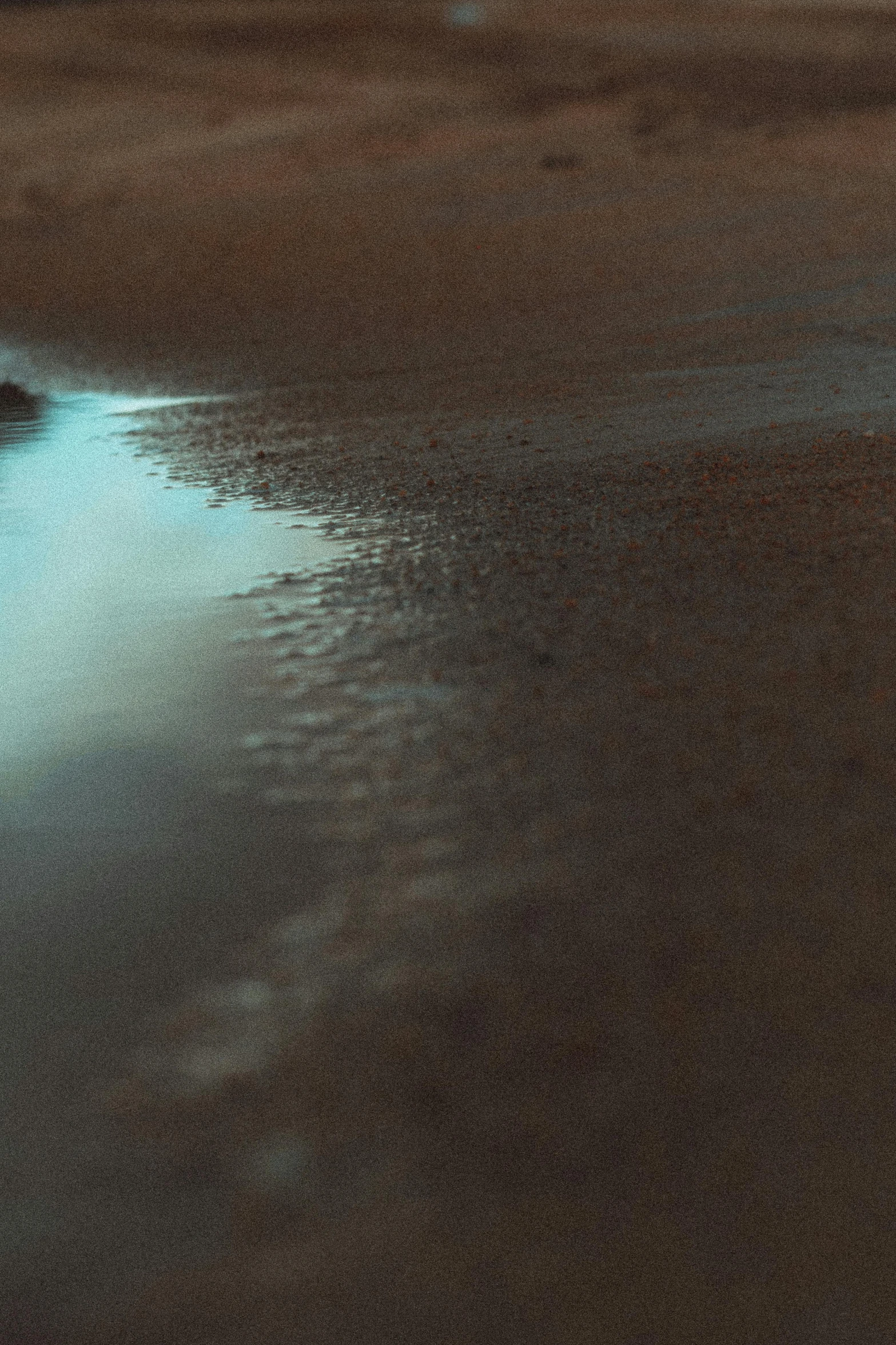 a body of water sitting on top of a sandy beach, an album cover, unsplash contest winner, australian tonalism, 8 k detail, puddles, photo 8 k, sandy colors