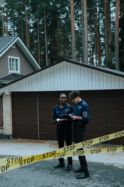 two police officers standing in front of a house, by Attila Meszlenyi, pexels contest winner, police tape, woman, fall season, inspect in inventory image