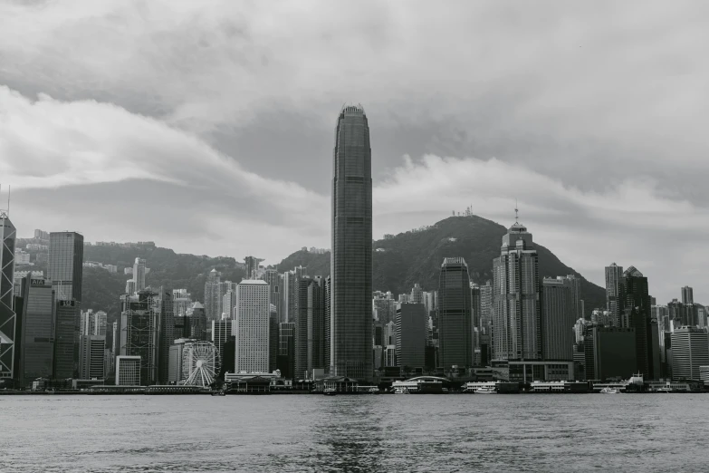 a black and white photo of a city skyline, by Patrick Ching, pexels contest winner, view from the sea, high quality upload, chinese building, 90s photo