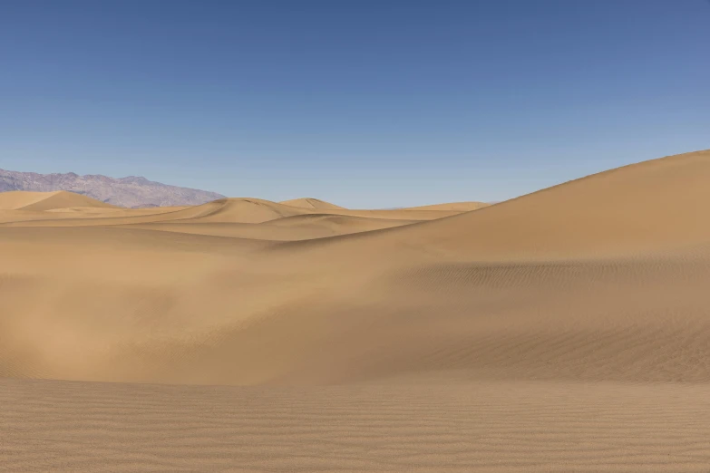 a person riding a horse in the desert, large scale photo, fan favorite, death valley, background image