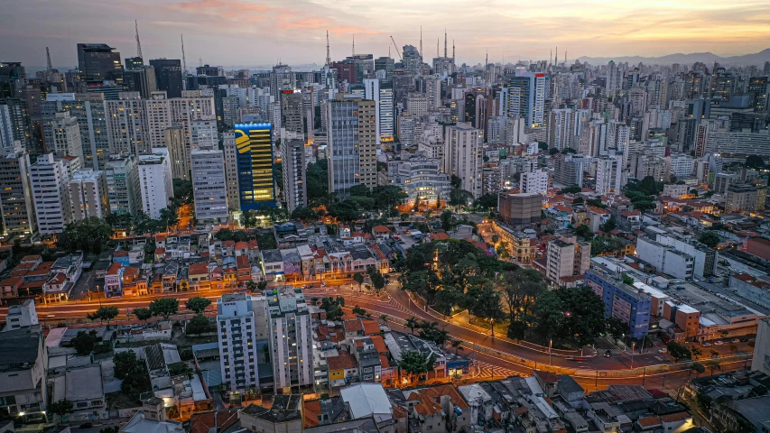 an aerial view of a city at dusk, by Felipe Seade, pexels contest winner, square, brazilian, helio oiticica, high quality image