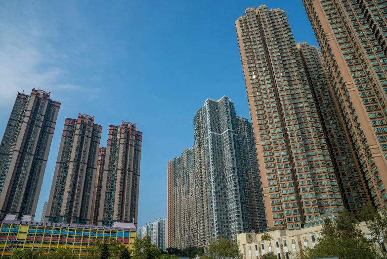 a group of tall buildings sitting next to each other, pexels contest winner, gutai group, guangjian, 15081959 21121991 01012000 4k, settlement, panels