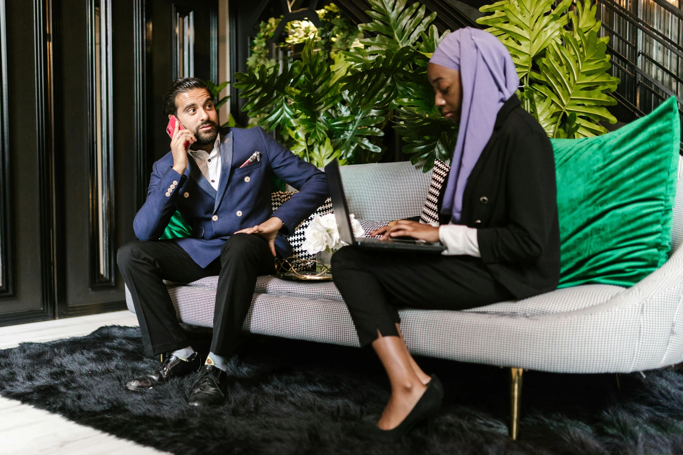 two people sitting on a couch with laptops, pexels contest winner, hurufiyya, business attire, riyahd cassiem, talking, elegantly dressed