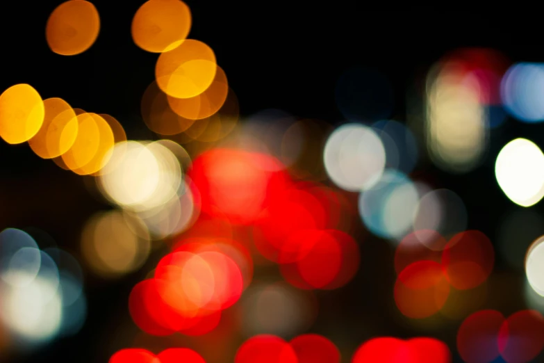 a blurry image of a city street at night, a picture, unsplash, abstract expressionism, 15081959 21121991 01012000 4k, close - up bokeh, red and yellow light, multicoloured