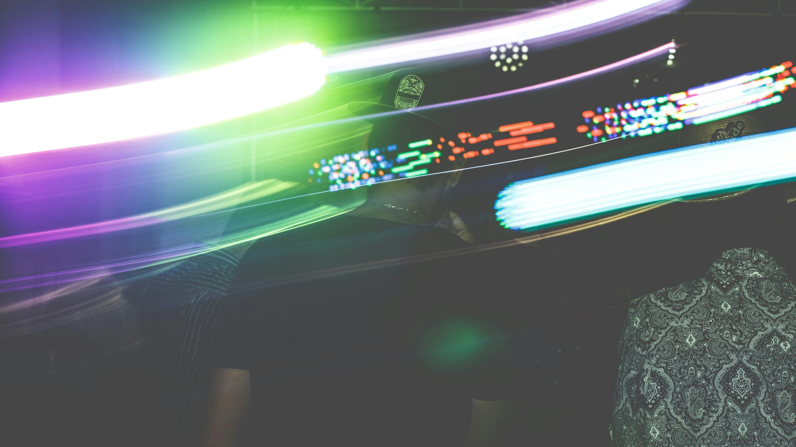 a man riding a skateboard down a street at night, a hologram, by Adam Marczyński, unsplash, holography, in a nightclub, arcade machine, middle close up shot, green lightsaber