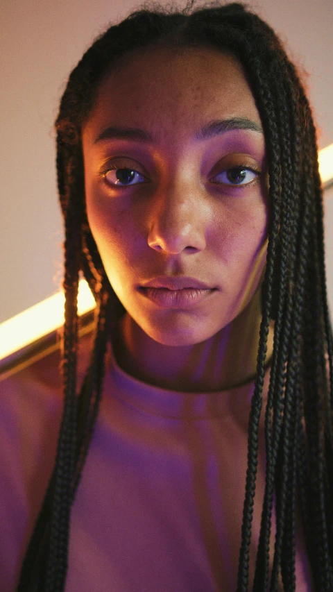 a close up of a person with long hair, trending on pexels, hyperrealism, ashteroth, police lights shine on her face, model posing, promotional image