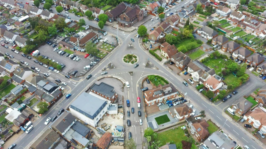 an aerial view of an intersection in a residential area, by Julian Allen, barnet, thumbnail, square, commercial photograph