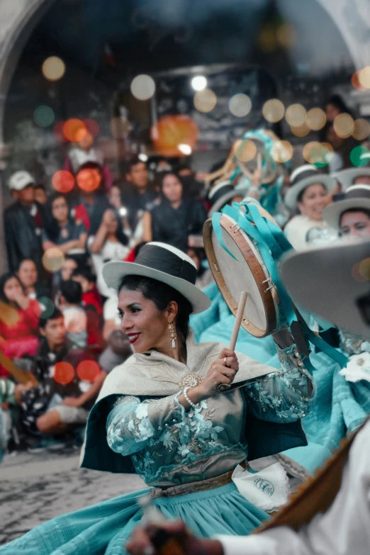 a group of people riding on the back of a horse, an album cover, by Alejandro Obregón, pexels contest winner, happening, wearing traditional garb, lights, congas, as though she is dancing