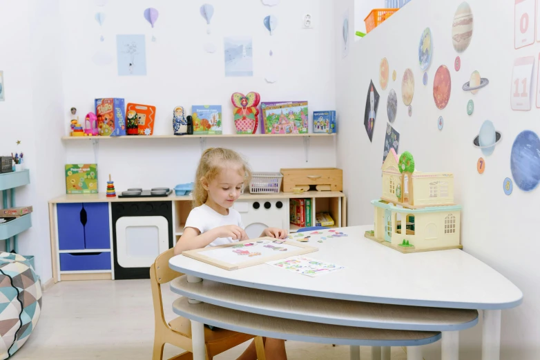 a little girl that is sitting at a table, pexels contest winner, danube school, puzzle-like room, eva elfie, 15081959 21121991 01012000 4k, profile image