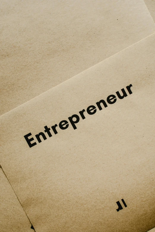 a pile of brown paper with the word entrepreneur written on it, thumbnail, spacetime envelopment, multi-part, 1