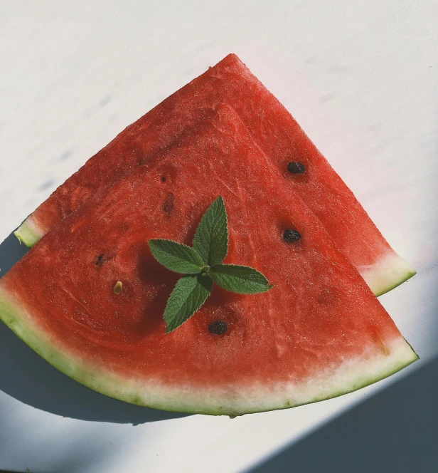a slice of watermelon sitting on top of a table
