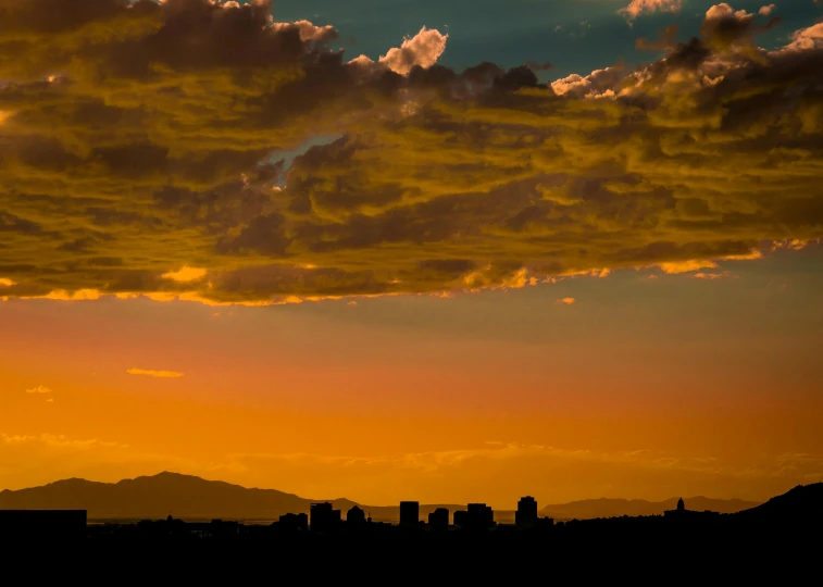 a plane flying over a city at sunset, by Peter Churcher, pexels contest winner, romanticism, beautiful new mexico sunset, silhouette :7, fine art print, altostratus clouds