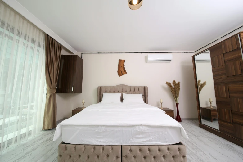 a bed sitting in a bedroom next to a window, located in hajibektash complex, 8k quality, georgic, : 5 stylish