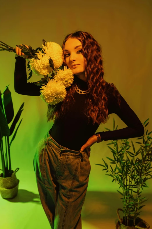 a woman holding a bunch of flowers next to a potted plant, an album cover, inspired by Elsa Bleda, trending on pexels, renaissance, portrait sophie mudd, green lights, posing for a picture, with long curly