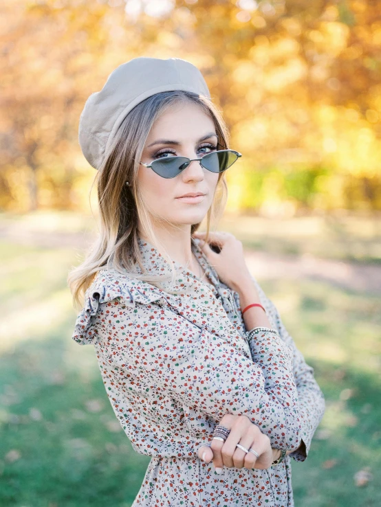 a woman in a dress and hat posing for a picture, a picture, by Julia Pishtar, beret and sunglasses, high quality image, trending photo, fall season