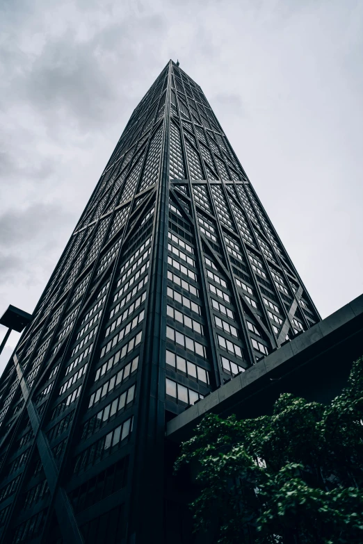 a very tall building with a lot of windows, pexels contest winner, black steel buildings, ((monolith)), arasaka, exterior photo