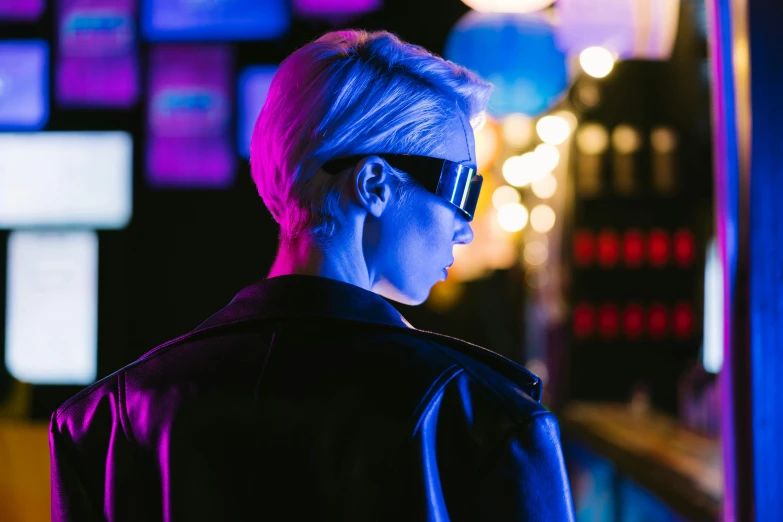 a close up of a person wearing sunglasses, cyberpunk art, inspired by roger deakins, altermodern, annie leonhart in a neon city, neon bar lights, cinematic blue lighting, with cinematic colour palette