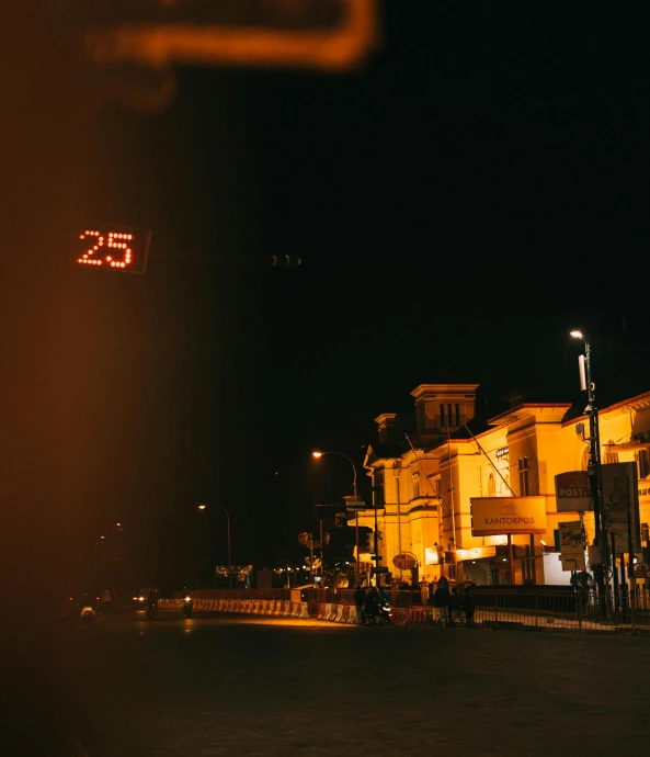 a clock that is on the side of a building, pexels contest winner, postminimalism, watching night streets, guwahati, golden number, blade runner 2049 style