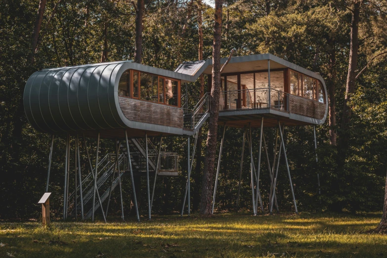 a tree house in the middle of a forest, by Emma Andijewska, unsplash contest winner, art nouveau, award winning modern design, houses on stilts, sinuous, front and side view