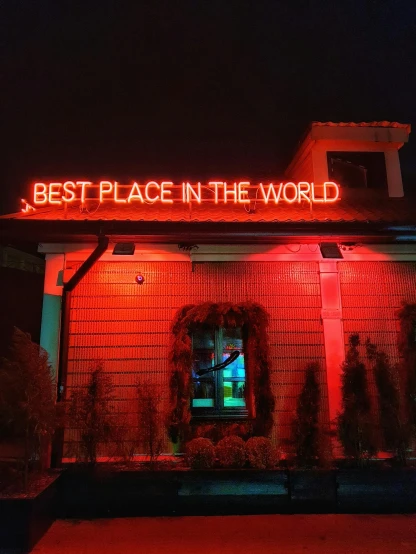 a building with a sign that says best place in the world, an album cover, trending on unsplash, glowing red, non binary future world, restaurant, profile image