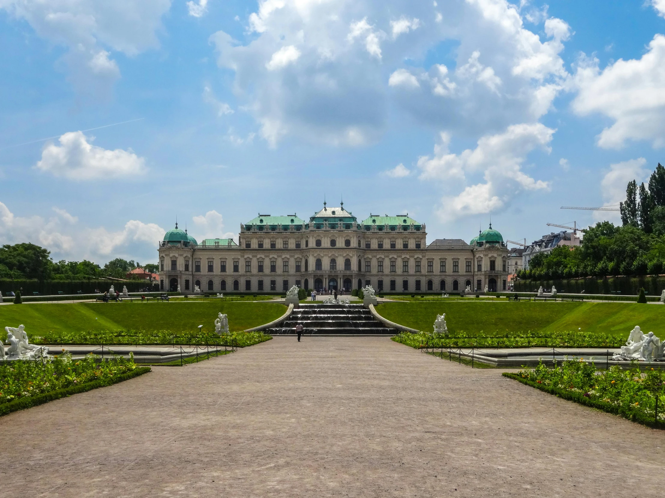 a large building sitting on top of a lush green field, a marble sculpture, pexels contest winner, rococo, vienna secesion style, panoramic, square, coronation