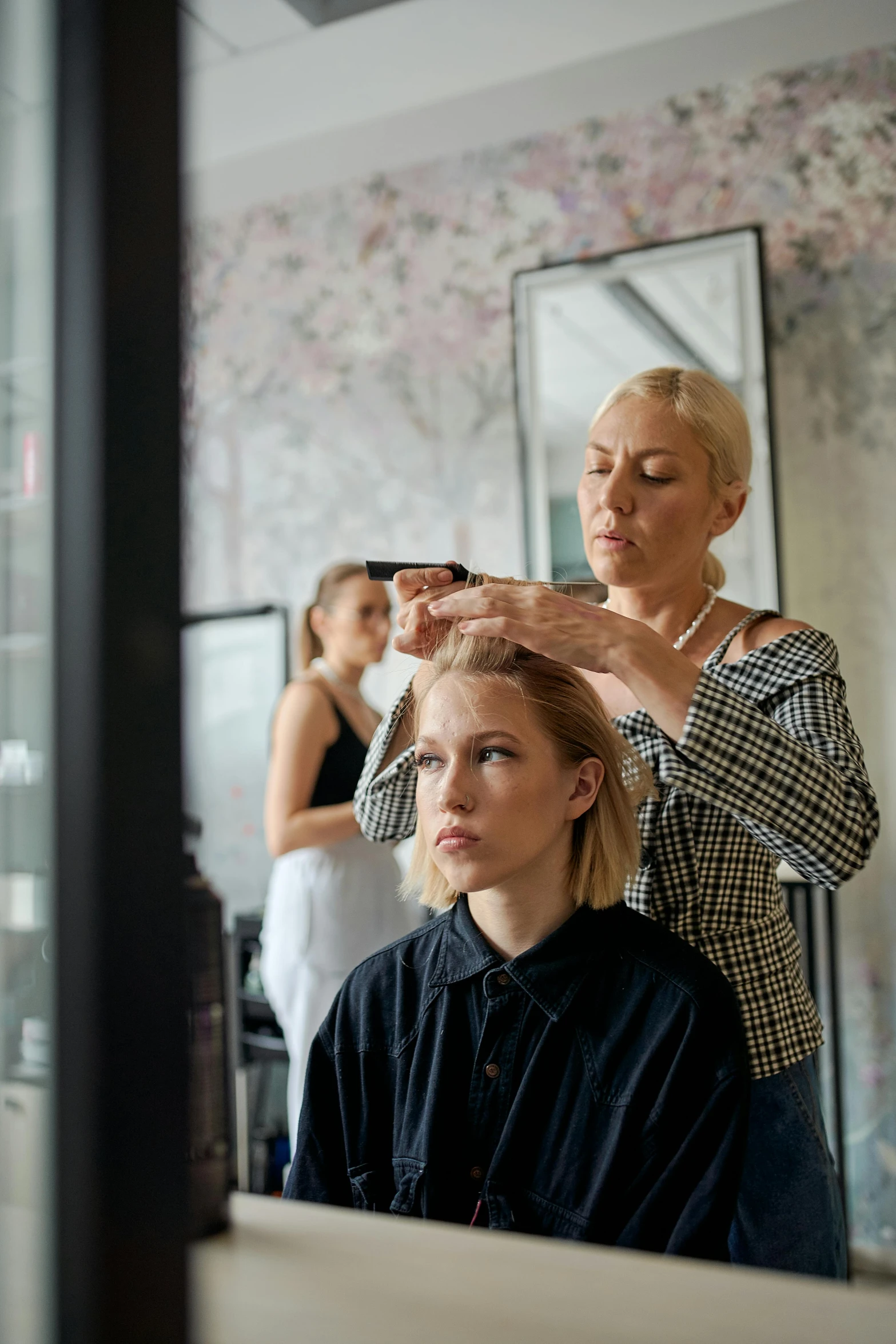 a woman getting her hair done in a salon, by Adam Saks, trending on unsplash, renaissance, arper's bazaar, a blond, wētā fx, half - length photo