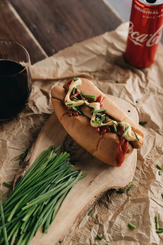 a hot dog sitting on top of a wooden cutting board, a picture, inspired by Reuben Tam, unsplash, red wine, bao phan, profile image, nuka cola