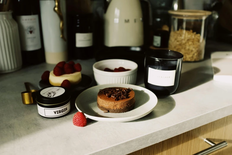 a close up of a plate of food on a counter, a still life, inspired by Richmond Barthé, unsplash, chocolate, jar on a shelf, high quality product image”, made of smooth black goo