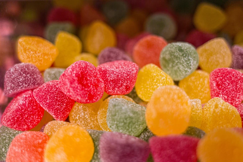 a pile of gummy hearts sitting on top of each other, by Daniel Lieske, pexels, award - winning crisp details, bells, mid closeup, seventies