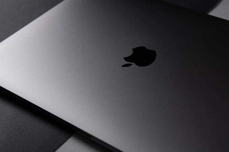 an apple laptop computer sitting on top of a table, trending on pexels, computer art, vantablack gi, close-up shot from behind, high quality product image”, rectangle