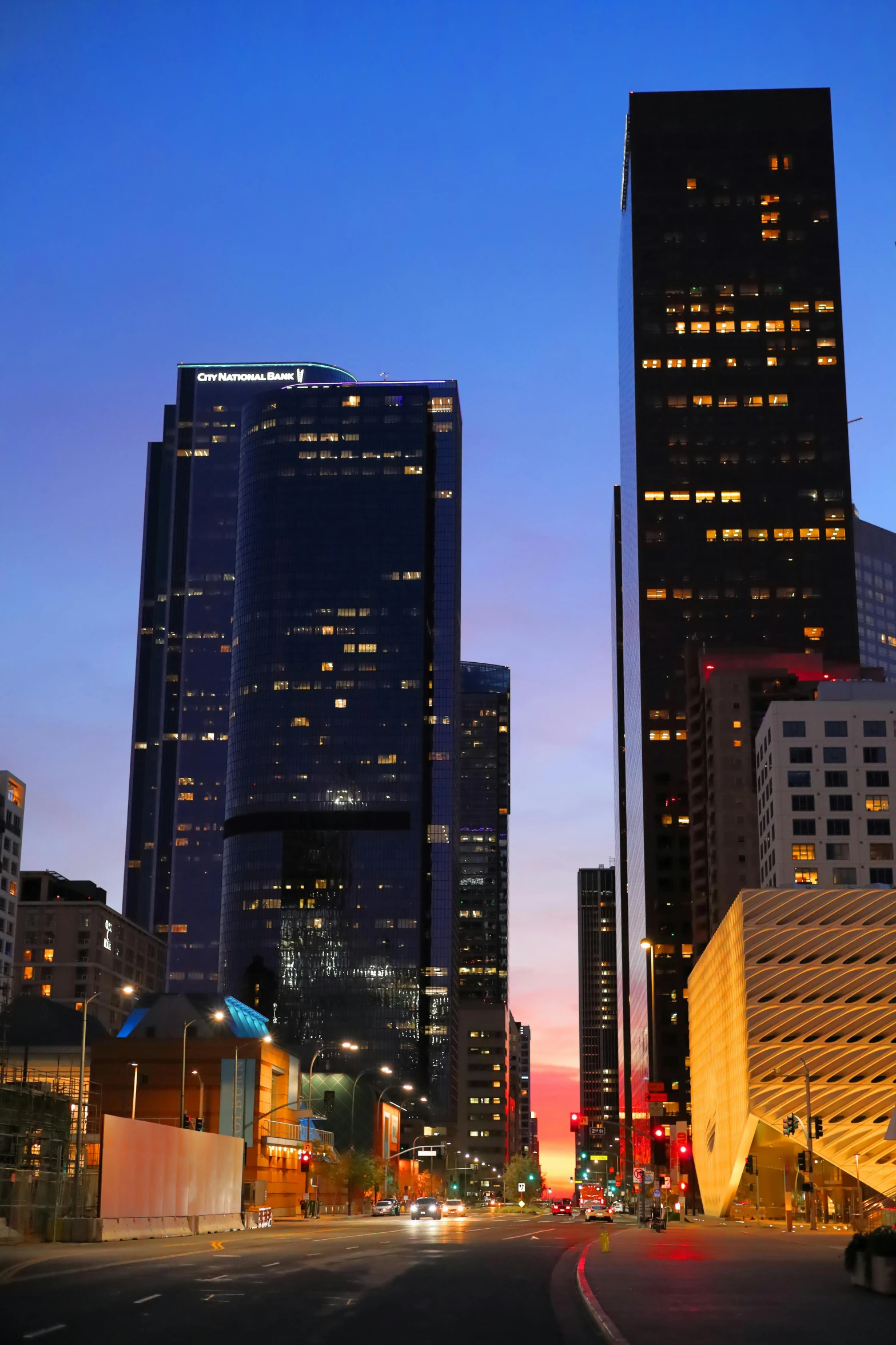 a city street filled with lots of tall buildings, inspired by L. A. Ring, renaissance, at twilight, los angelos, exterior, skybridge towers