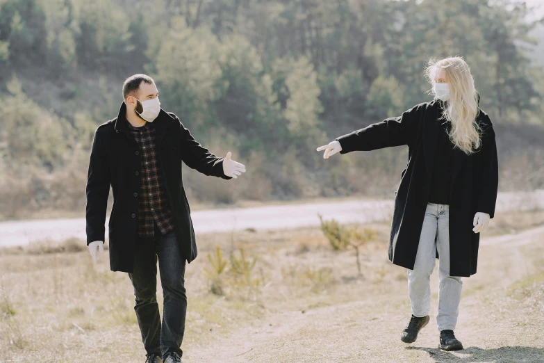 a man and a woman walking down a dirt road, white man with black fabric mask, cute photo, thumbnail, picnic