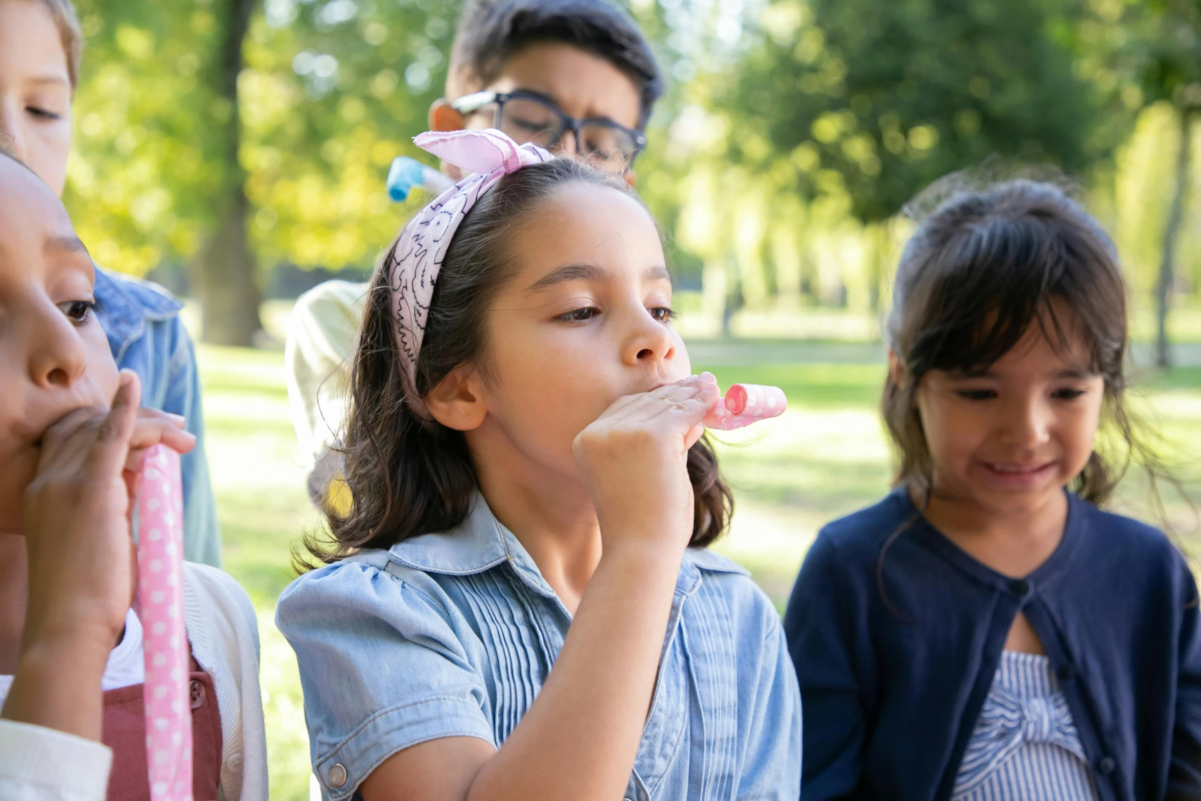 a group of children blowing bubbles in a park, pexels contest winner, holding a baguette, avatar image, eating cakes, high quality product image”