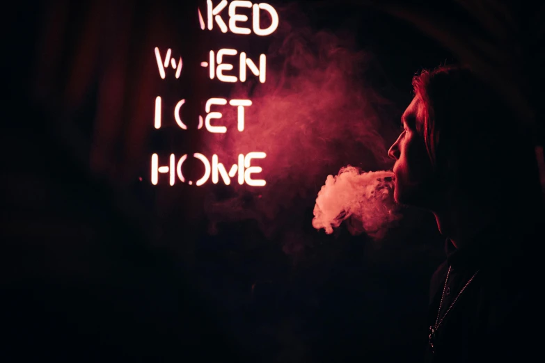 a woman standing in front of a neon sign, inspired by Elsa Bleda, pexels contest winner, smoking a magical bong, sweet home, red ink, lets get weird