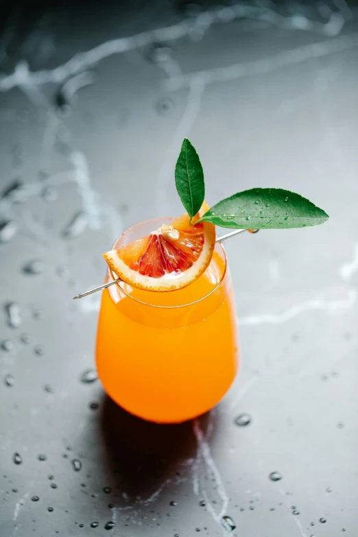 an orange drink with a garnish garnish garnish garnish garnish garnish garnish garn, unsplash, renaissance, on a gray background, ivy's, rays, bay area