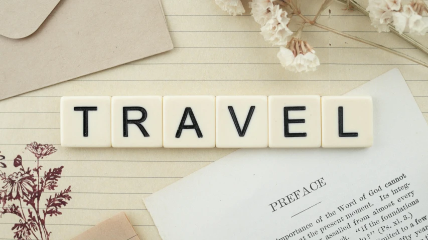 a couple of letters sitting on top of a table, trending on pexels, private press, traveler, tiles, vervia, skincare