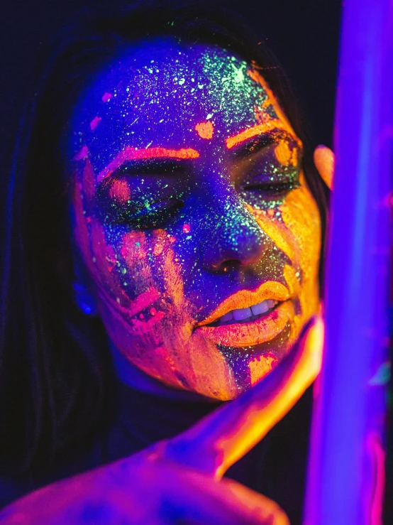 a woman with fluorescent paint on her face, trending on pexels, art photography, glitter accents on figure, 33mm photo, portrait of sherlyn chopra, vhs colour photography