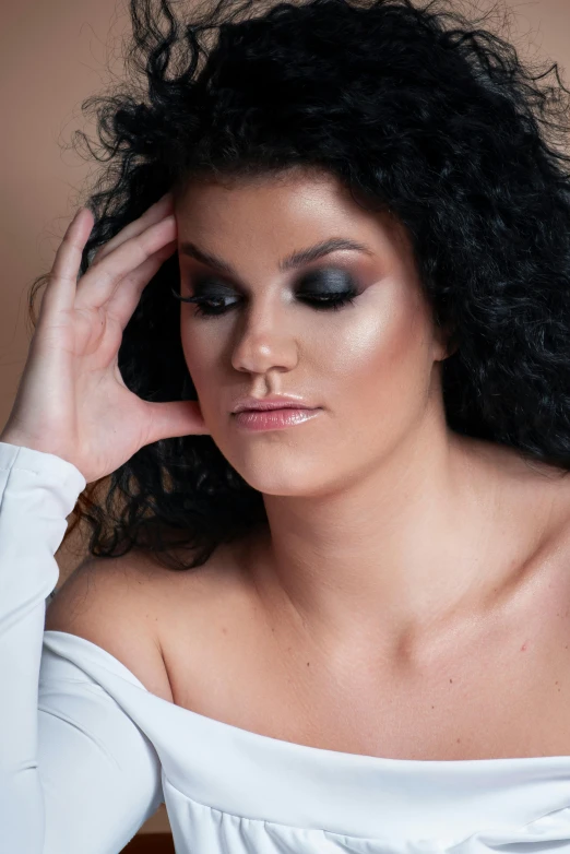 a woman in a white dress posing for a picture, an album cover, inspired by Mac Conner, trending on pexels, renaissance, black eyeshadow, close - up studio photo, full product shot, lush unkempt black hair