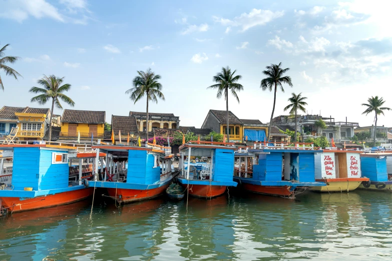 a number of boats in a body of water, by Tom Wänerstrand, pexels contest winner, phuoc quan, small port village, avatar image, profile image