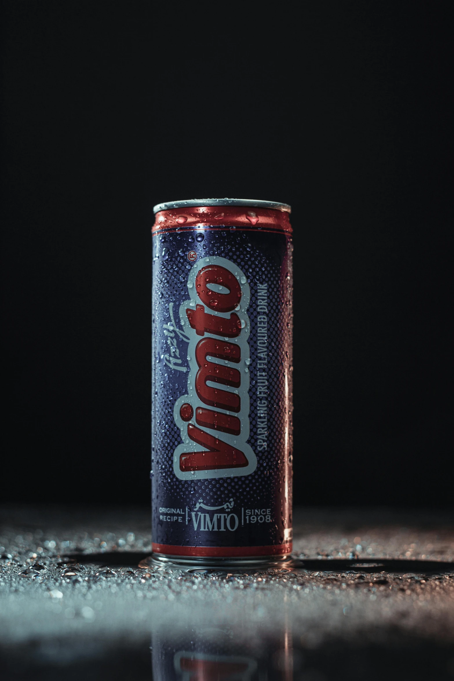 a can of soda sitting on top of a table, by Juan Giménez, unsplash contest winner, vivid studio light, limbo, highly detailed product photo, indigo and venetian red